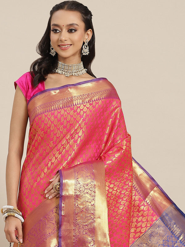 Pink brocade saree with detailed woven gold zari paisley pattern and matching blouse piece