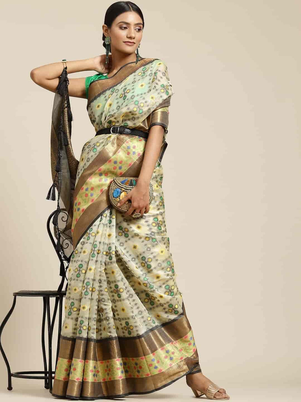 Beige Art Silk saree with geometric Ikat woven patterns