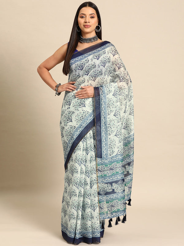 Blue cotton blend saree featuring traditional Dabu style prints with unstitched blouse piece