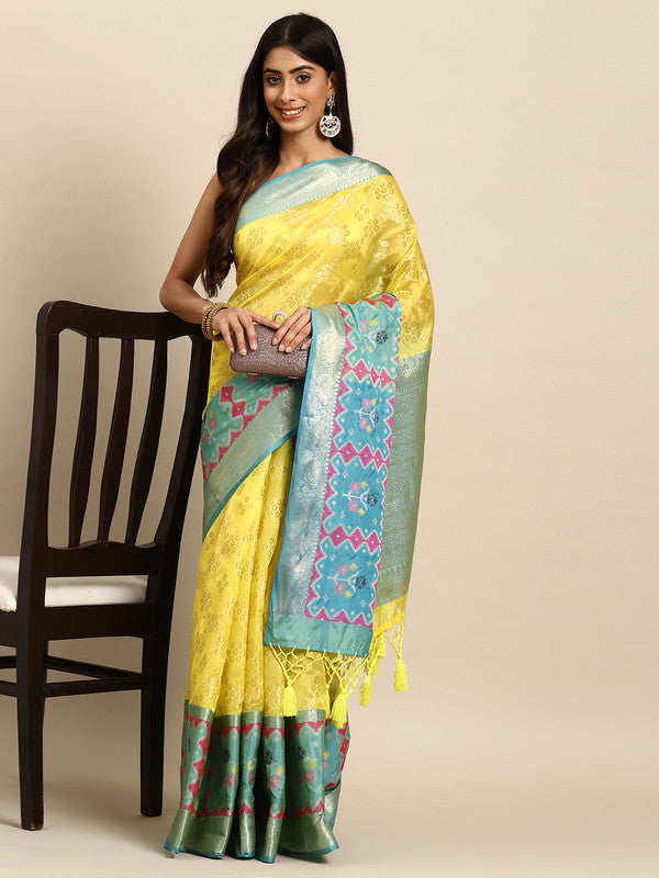 Yellow silk blend saree with woven zari geometric design and unstitched blouse