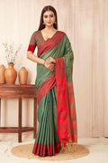 Solid green Banarasi soft silk saree with a smooth, elegant finish