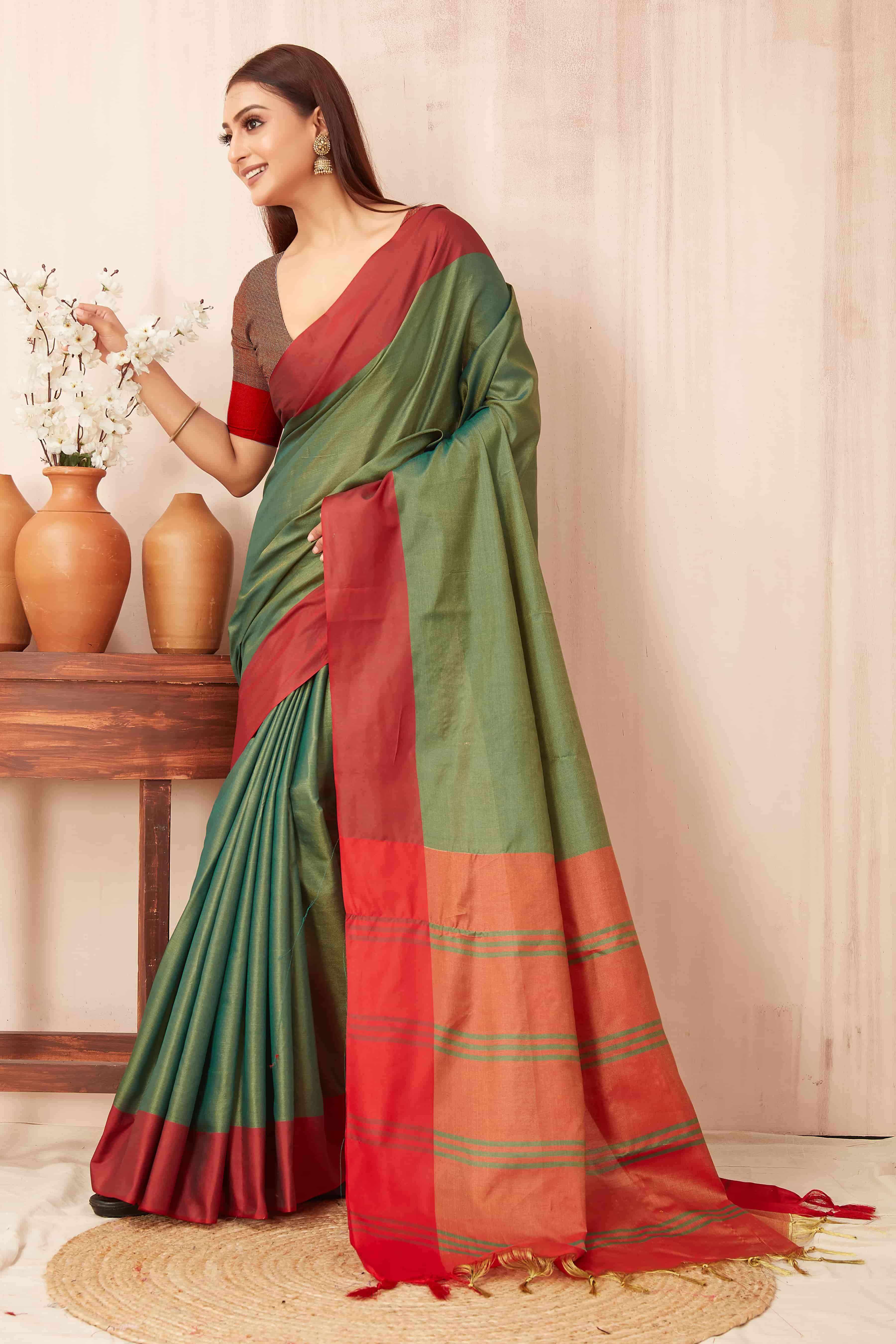 Green Banarasi Soft Silk Solid Saree with Elegant Finish