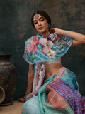 Bohemian style multicolor abstract print saree in teal, pink, white, and yellow with unstitched blouse