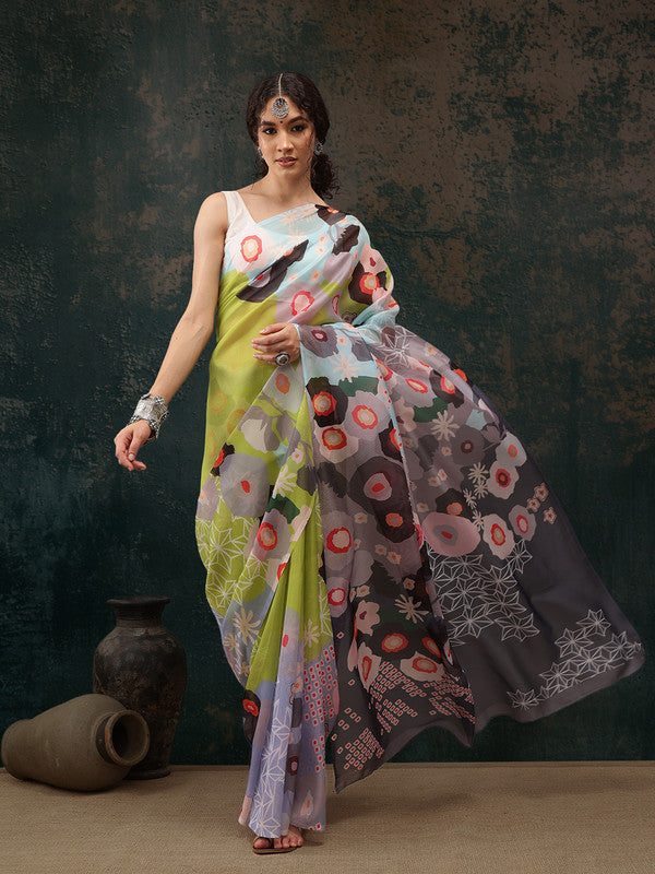 Green polyester saree with modern digital abstract print and matching unstitched blouse.