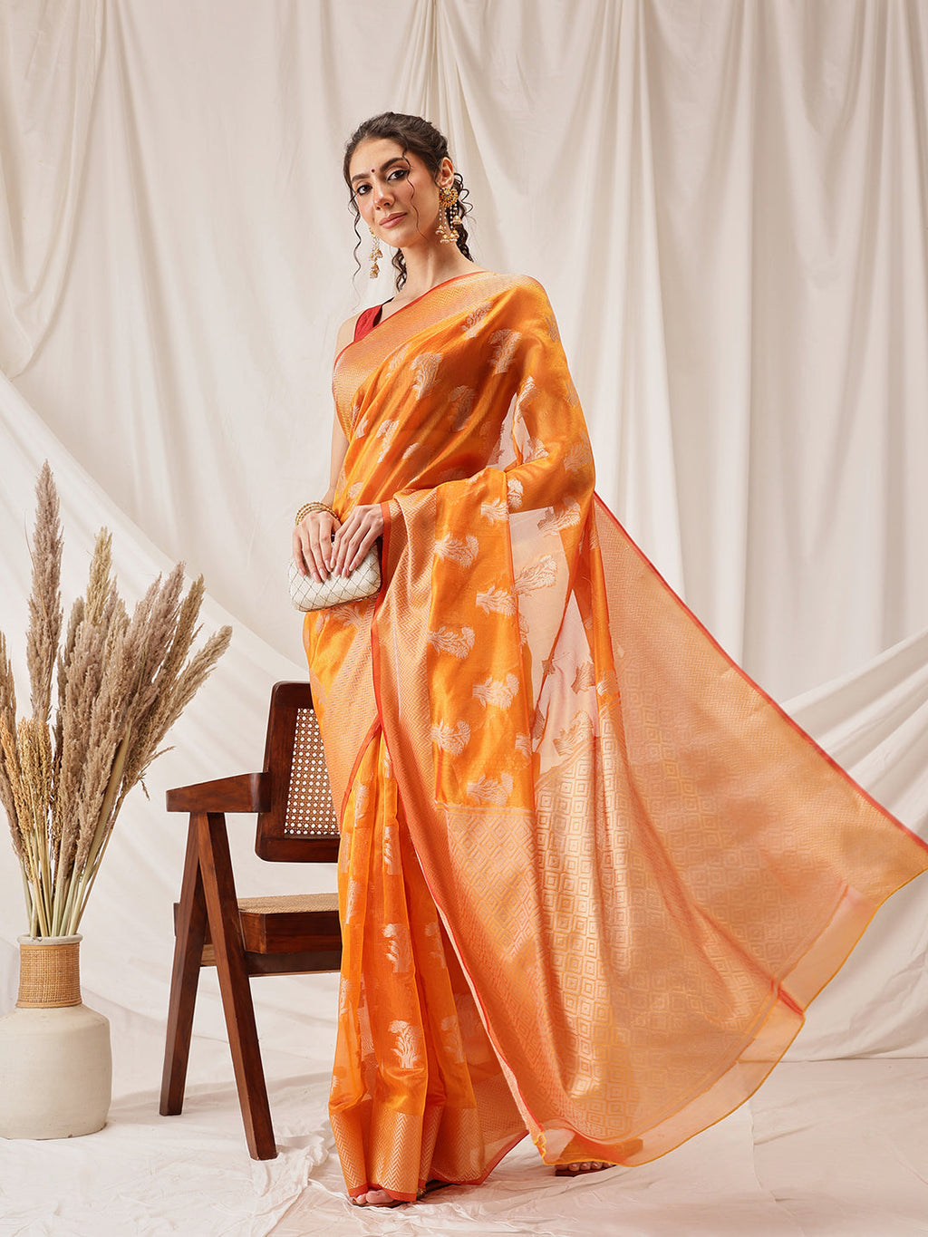 Yellow Banarasi Organza Silk saree with floral woven embroidery