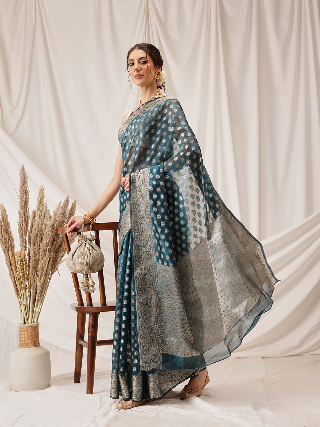 Teal Banarasi Organza Silk Saree with Floral Woven Design
