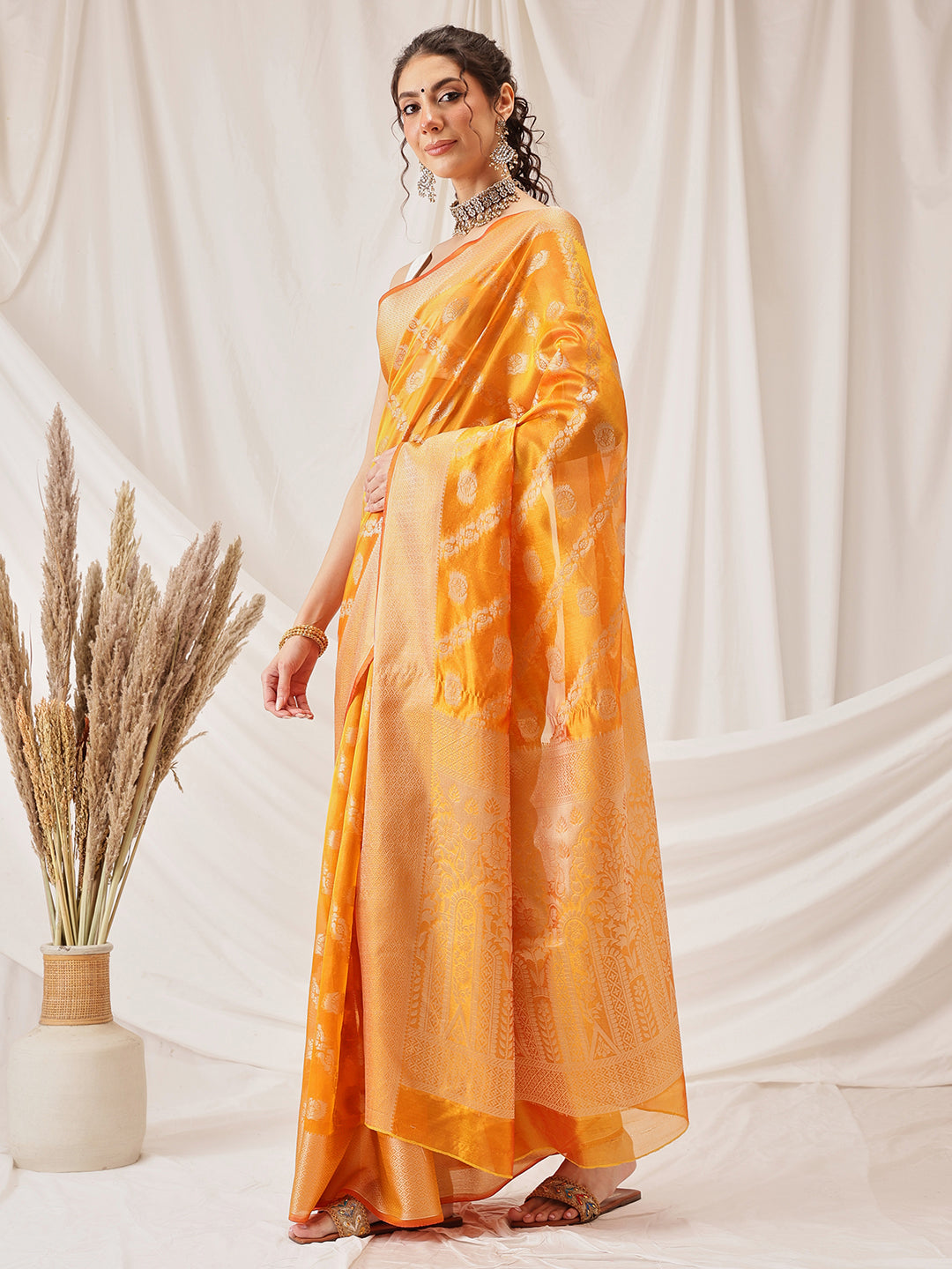 Yellow Organza Silk saree with Lahariya wave woven patterns