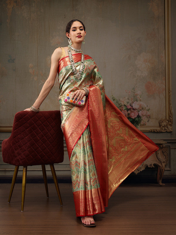 Multicolor pure silk saree with geometric zari weave patterns and unstitched blouse piece.