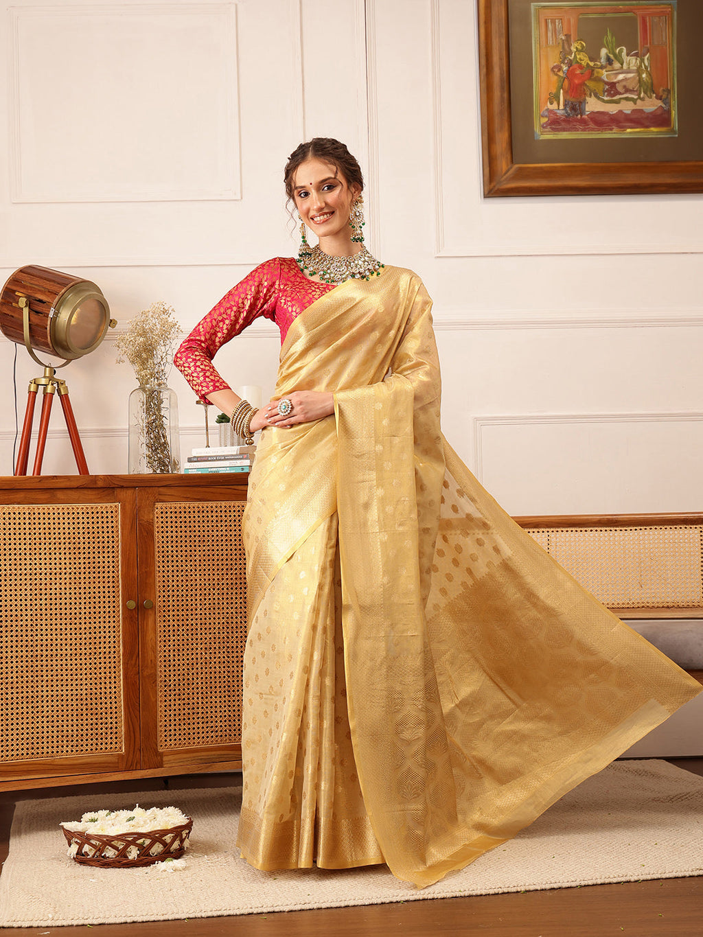 Beige Kanjivaram tissue silk saree featuring intricate floral zari woven patterns