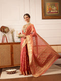 Pink Kanjivaram tissue silk saree with intricate floral zari woven details