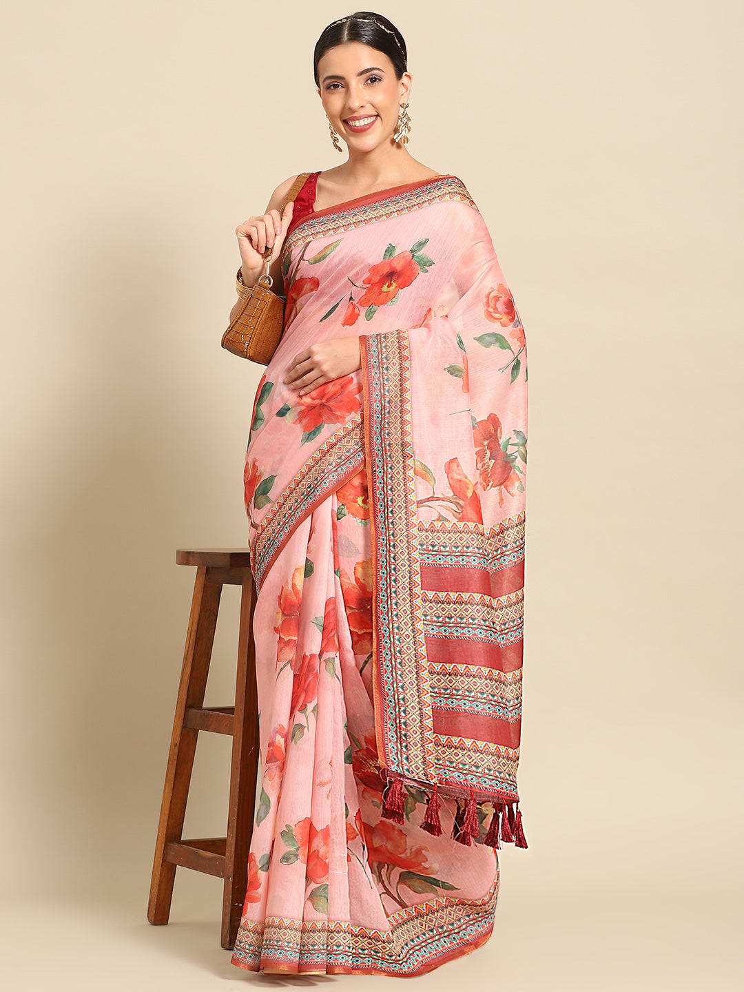 Pink pure cotton saree with vibrant floral prints and unstitched blouse