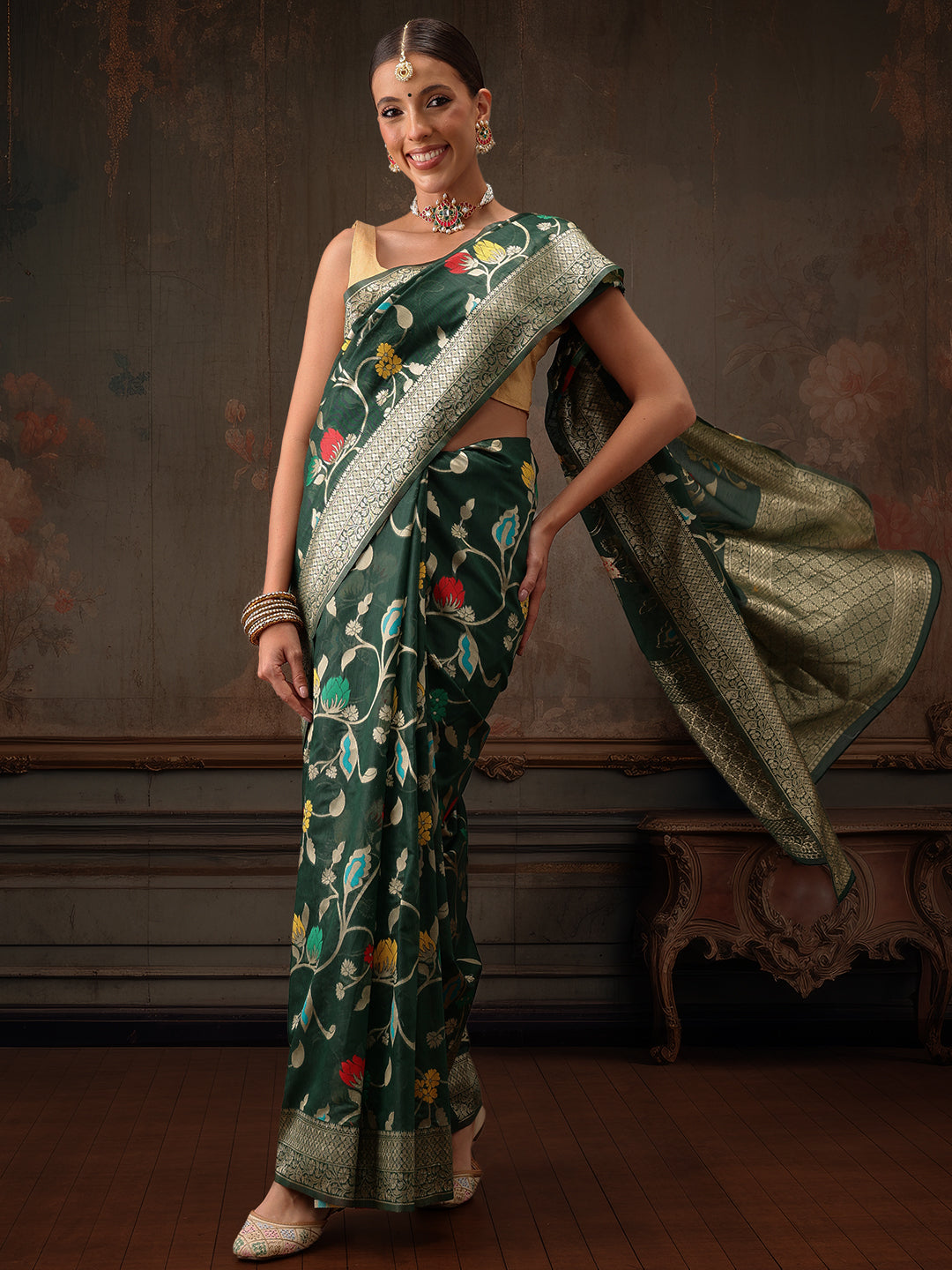 Green Jamdani cotton saree featuring intricate floral woven thread work details.