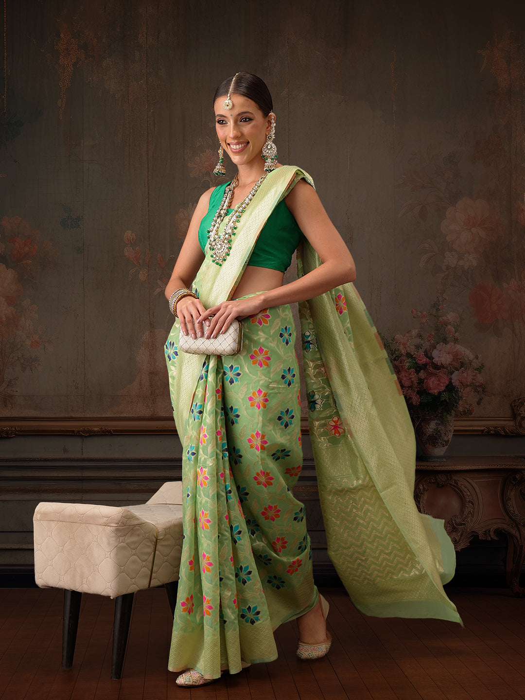 Lime green cotton Jamdani saree with floral woven thread detail