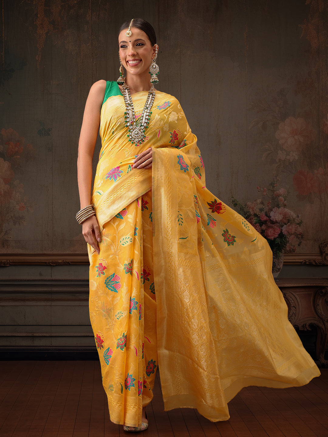 Mustard yellow Jamdani cotton saree with floral woven thread work details.