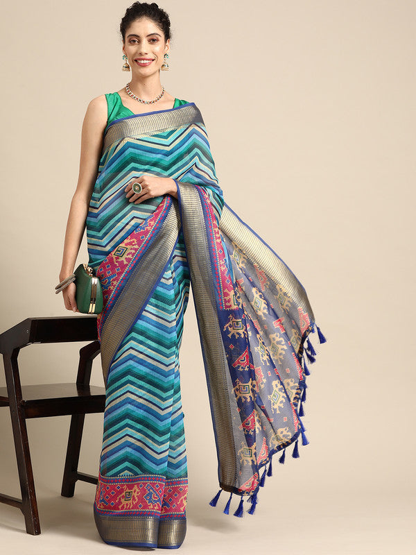 Blue silk cotton saree with a clean striped pattern and matching unstitched blouse piece.