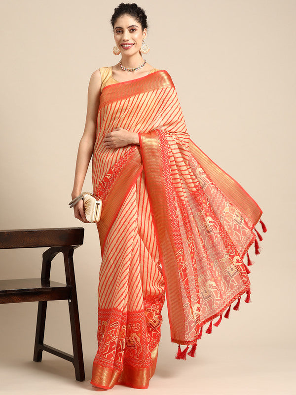Orange silk cotton saree with striped pattern and included unstitched blouse.