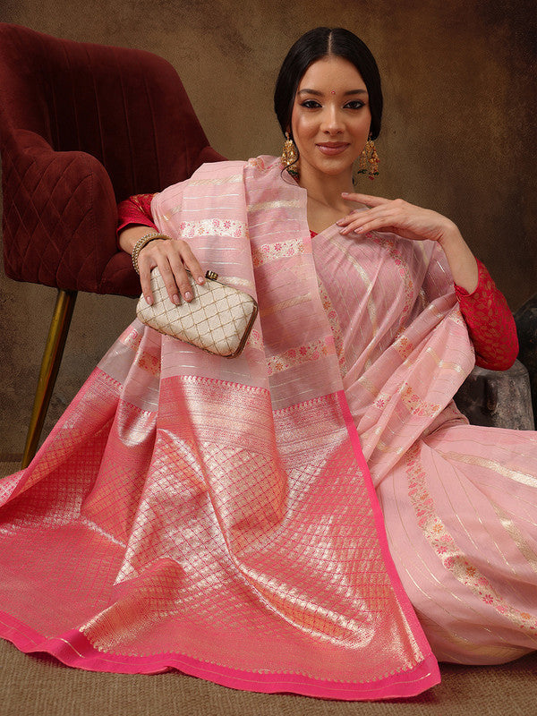 Pink cotton saree with woven Zari floral patterns and unstitched blouse