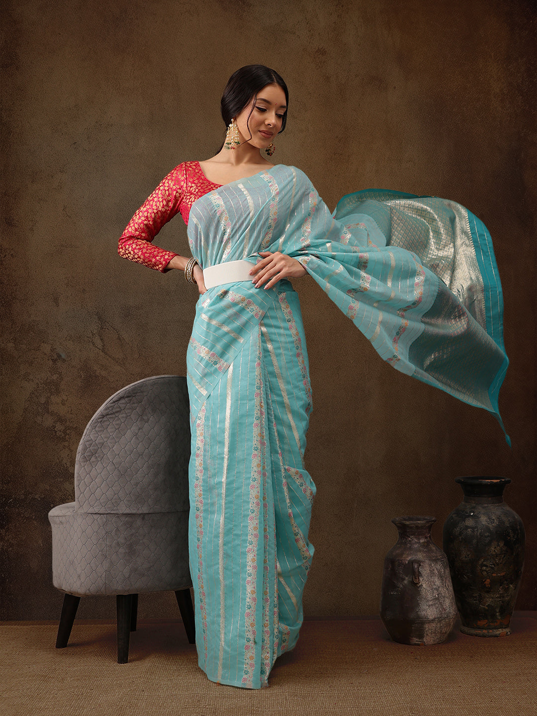 Turquoise cotton saree with woven zari floral design and unstitched blouse