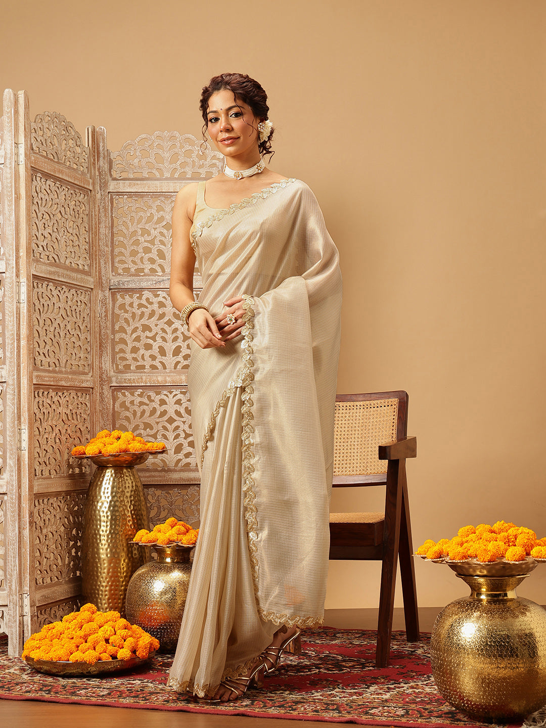 Beige Muga Silk saree with detailed Gota Patti lace border work