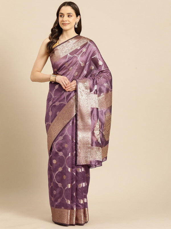 Light pink organza silk saree with woven gold zari floral motifs.