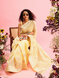 Yellow linen saree with woven thread floral patterns and an unstitched blouse piece