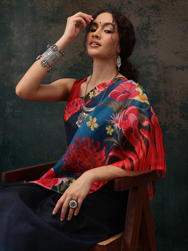 Royal blue polyester saree with digital floral print and matching unstitched blouse piece.