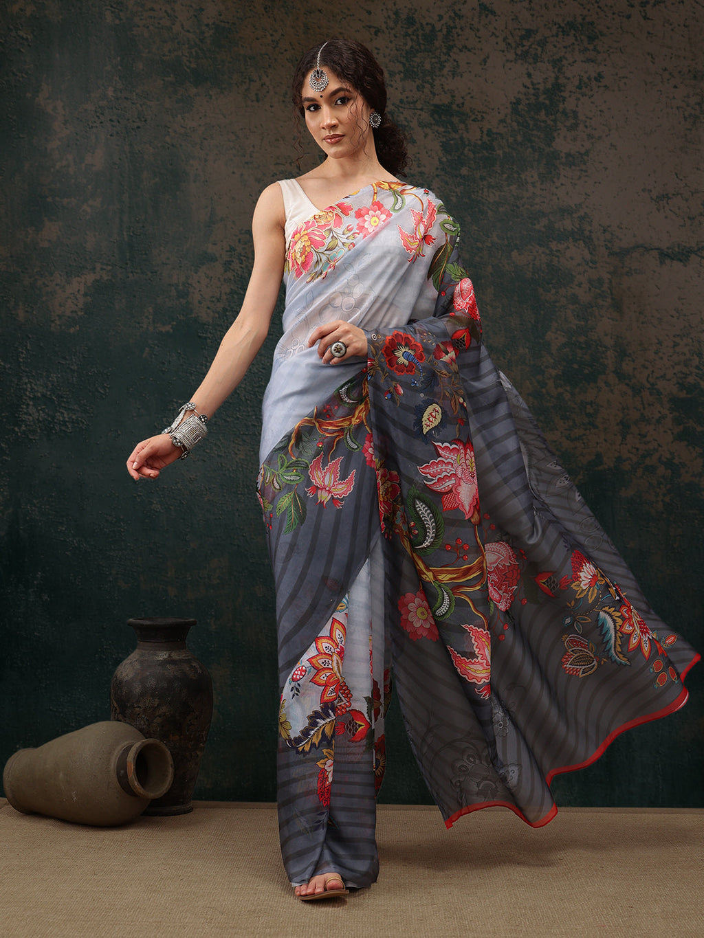 Sky blue polyester saree with digital floral print and unstitched blouse piece