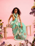 Turquoise cotton saree with woven floral thread detailing and unstitched blouse