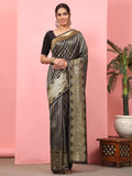 Black Banarasi art silk saree featuring a classic striped pattern and zari weaving.