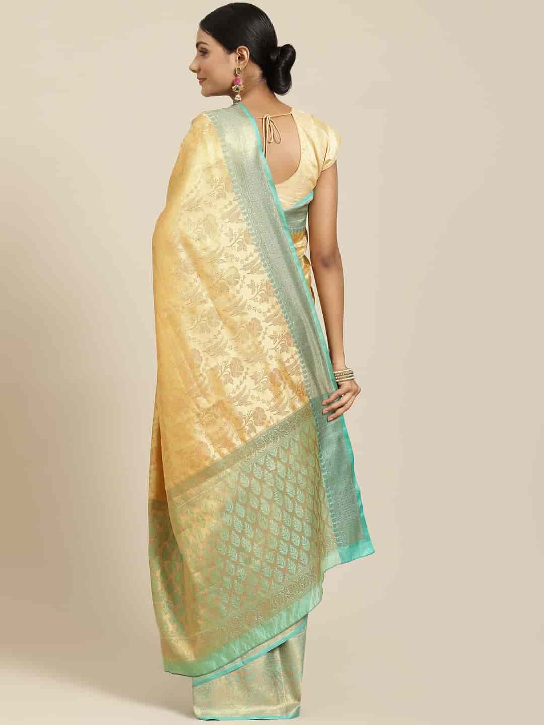 Beige Kanjeevaram Art Silk Floral Woven Design Saree