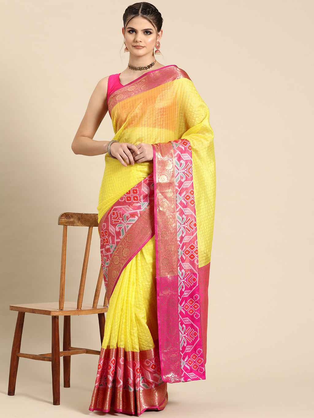 Yellow Banarasi silk saree with checked zari pattern and unstitched blouse