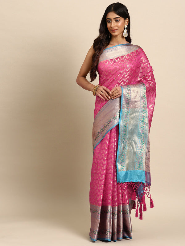 Pink Silk Blend saree with abstract patterns and gold zari work.
