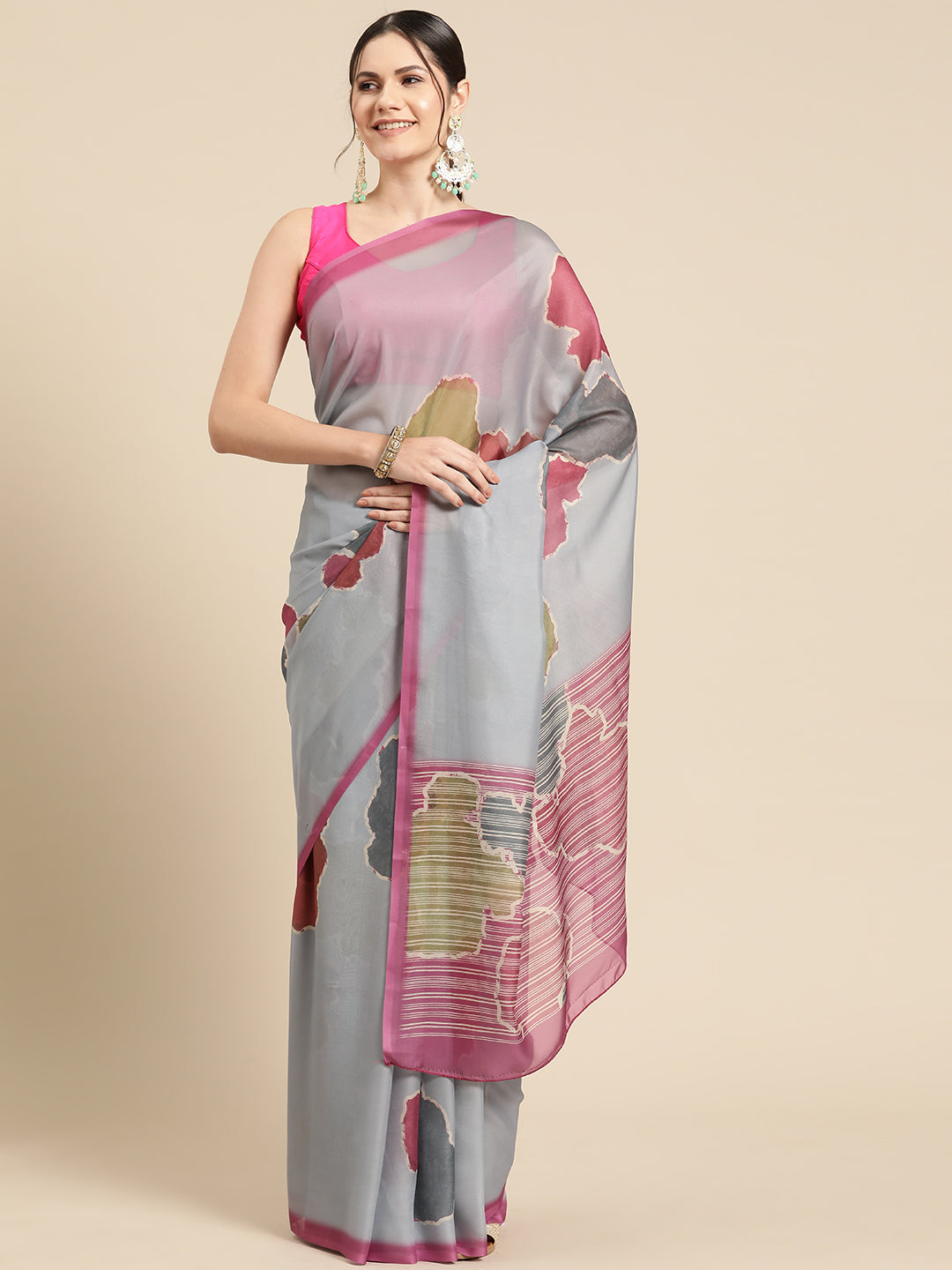 Dark gray silk blend saree featuring a modern abstract print with an unstitched blouse piece.