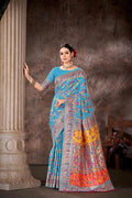 Blue Cotton Blend saree with woven floral thread work and matching unstitched blouse