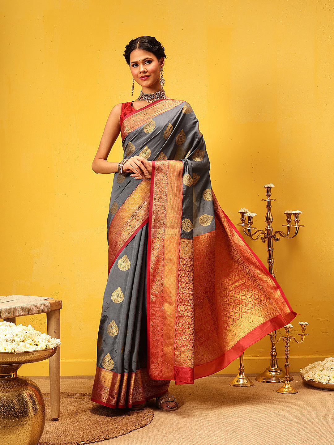 Elegant grey Kanjeevaram silk saree with traditional intricate woven design