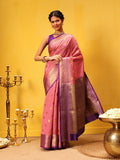 Pink Kanjeevaram silk saree with intricate traditional woven patterns