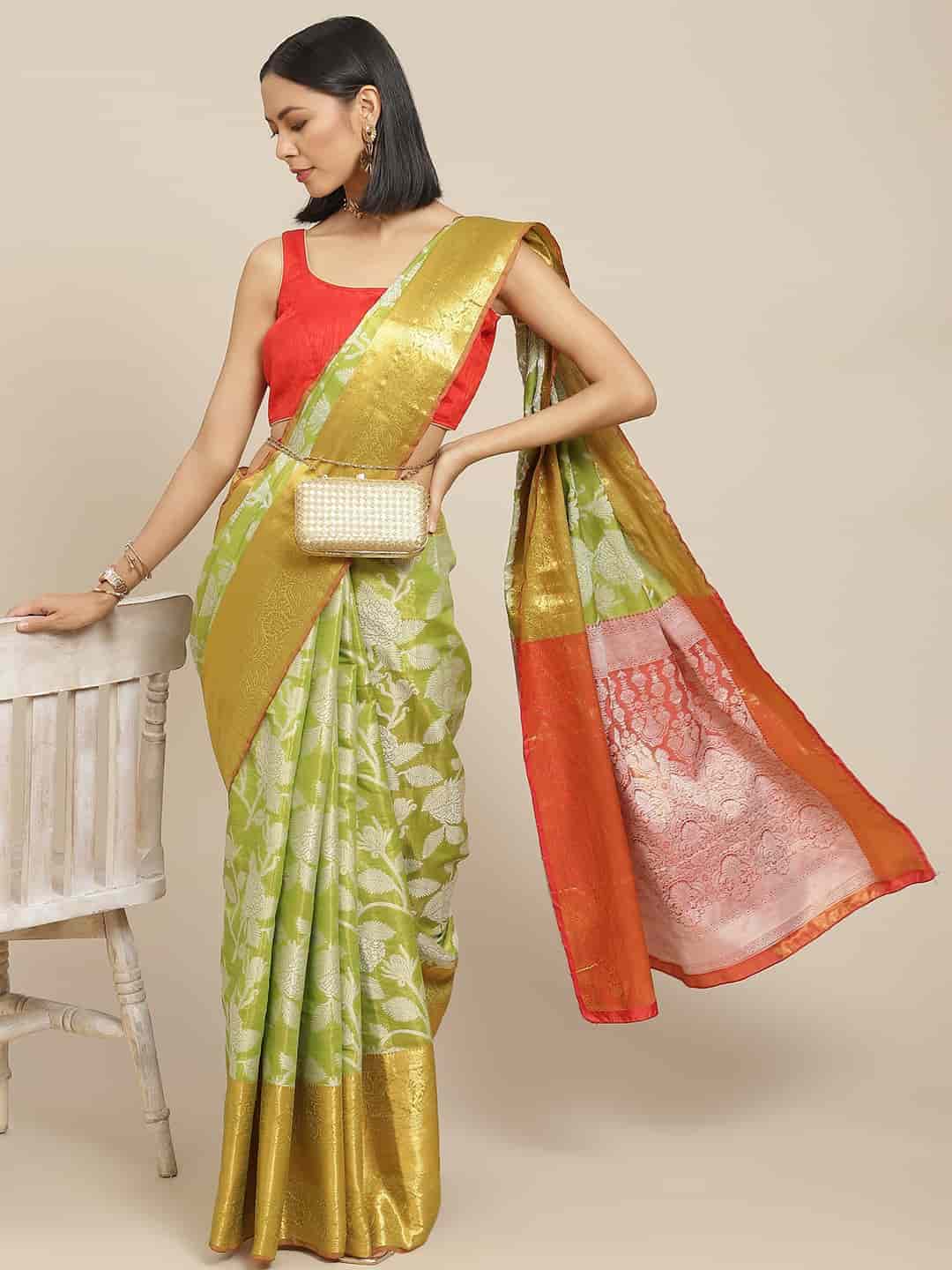 Green Banarasi tissue silk saree with intricate floral zari weaving