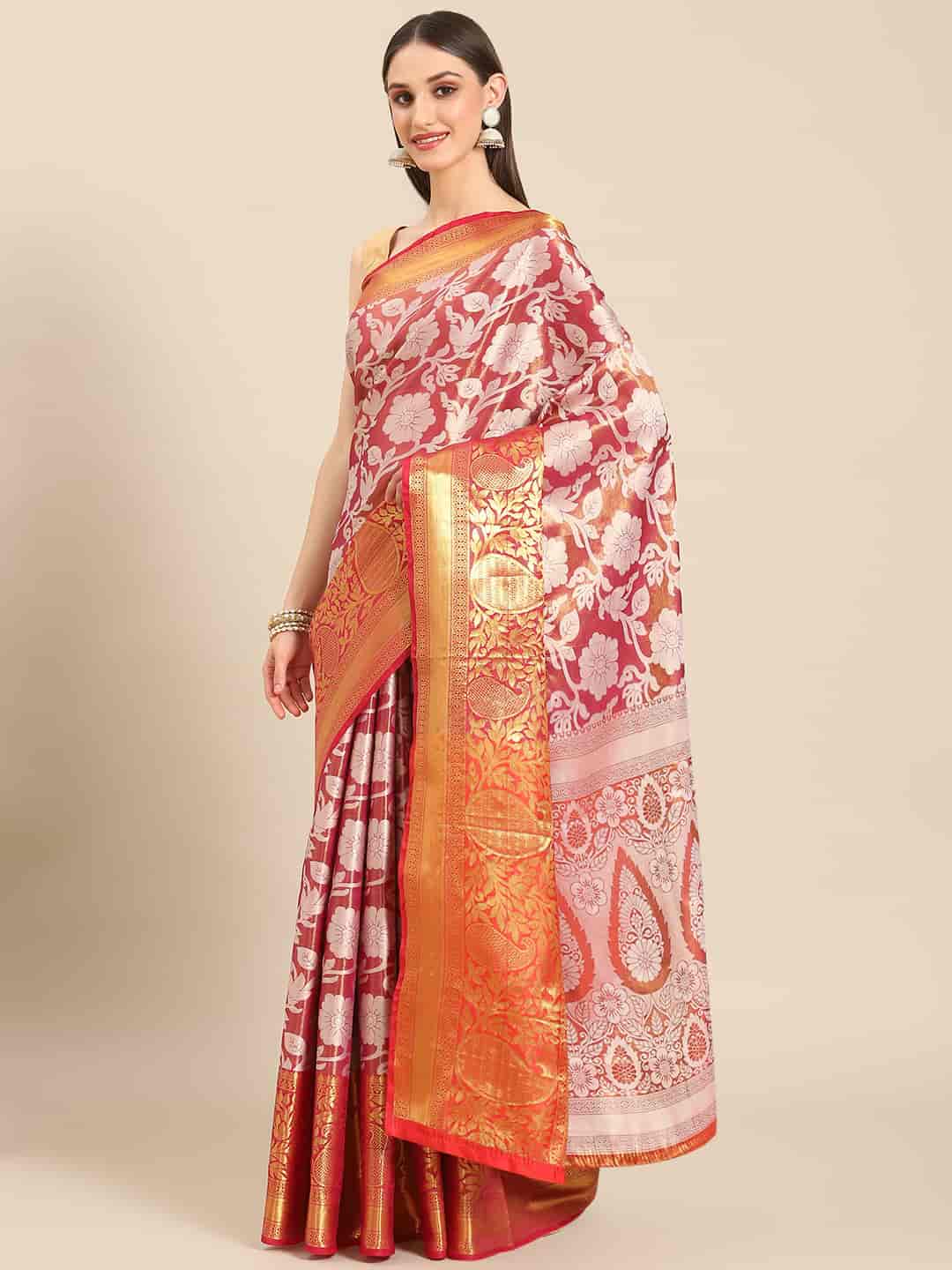 Pink tissue silk saree with woven zari floral design and unstitched blouse