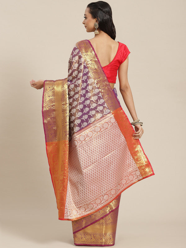 Purple brocade saree with floral zari weave and matching unstitched blouse