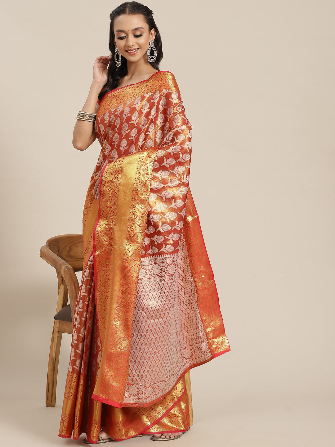 Elegant red brocade saree with floral woven zari embroidery and blouse fabric