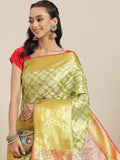 Green brocade saree with floral zari woven patterns and matching unstitched blouse piece