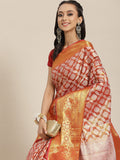 Elegant red brocade saree with intricate gold woven zari floral patterns and matching unstitched blouse piece.