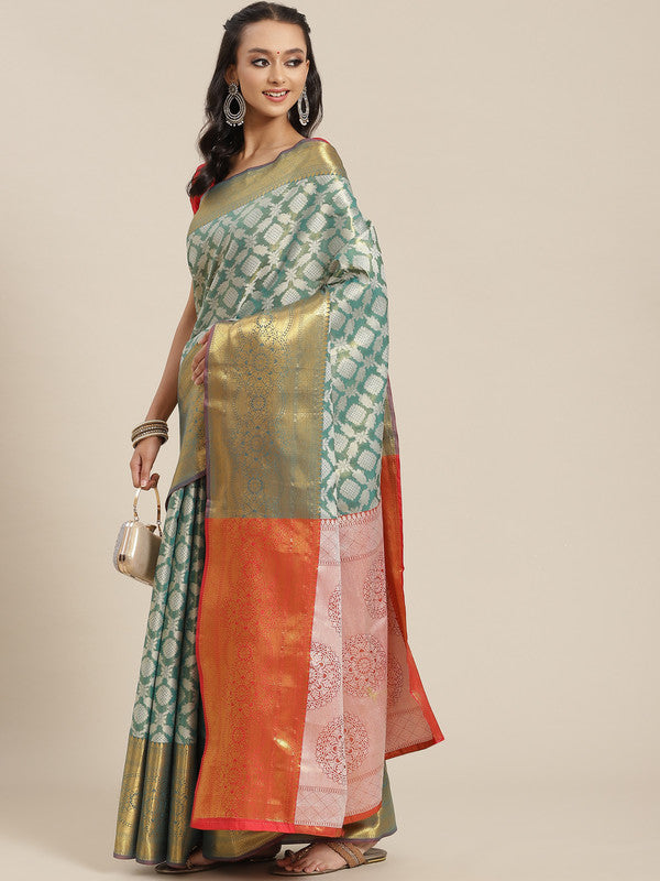 Turquoise brocade saree with woven Zari floral design and matching blouse piece