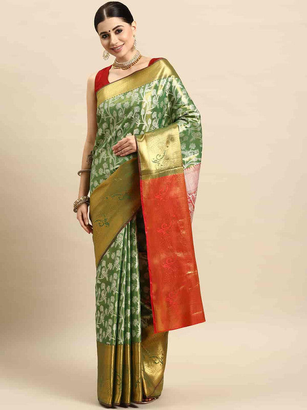Green brocade saree featuring floral zari designs with matching unstitched blouse