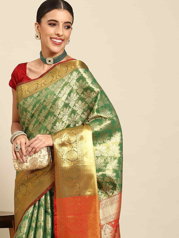 Green art silk floral saree with woven Zari design and unstitched blouse piece