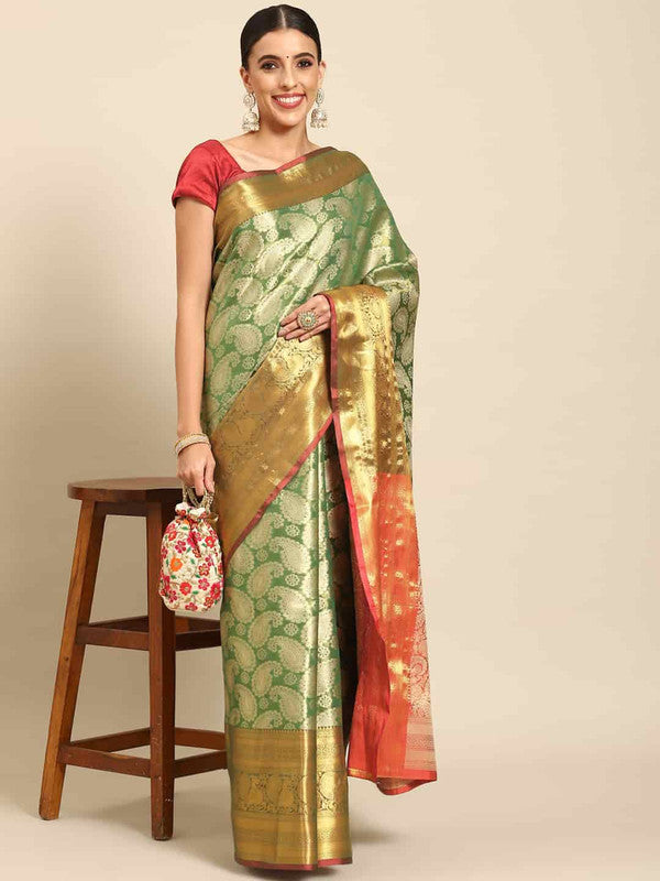 Green art silk saree with zari woven floral designs and matching unstitched blouse