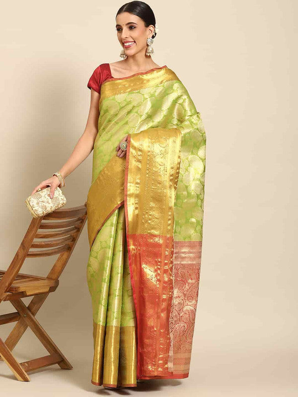 Green art silk saree with floral prints and woven zari design and unstitched blouse piece
