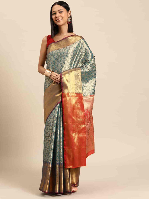 Turquoise brocade saree with golden zari ethnic motifs and unstitched blouse piece