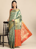 Turquoise Brocade saree with woven zari stripes and unstitched blouse piece