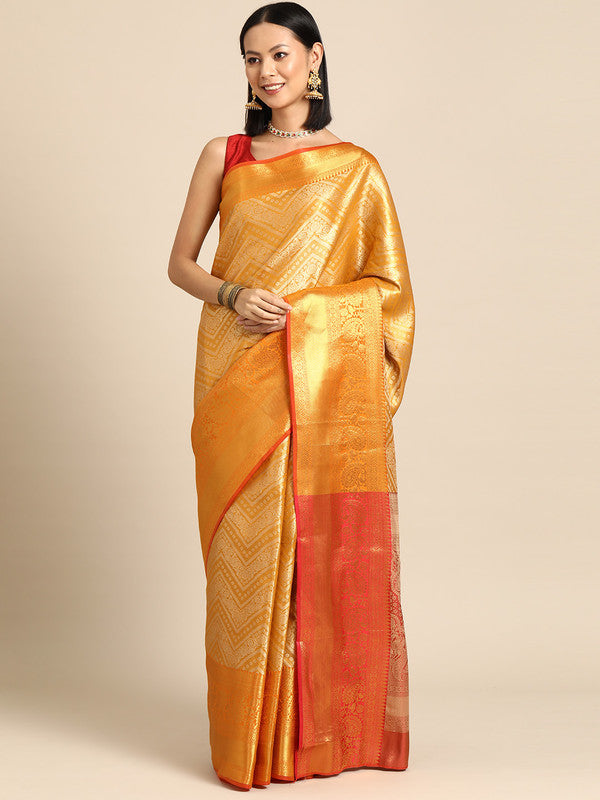 Yellow brocade saree with woven zari stripes and unstitched blouse